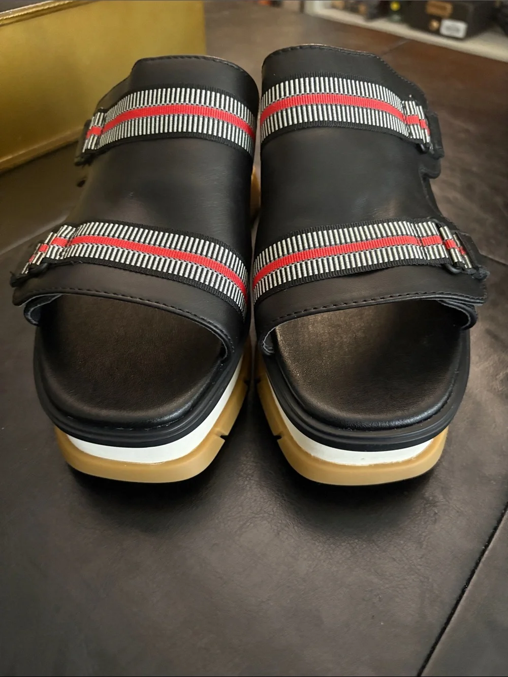 Sorel Black Slide Sandals with Red & White Stripes and Tan Sole
